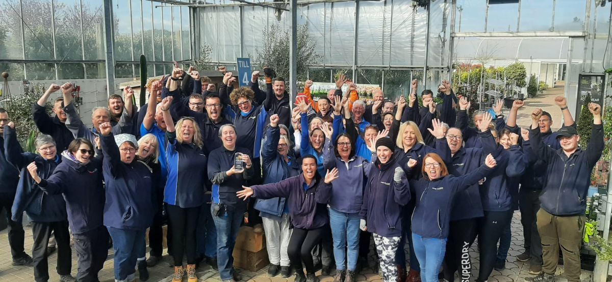 Large Staff Celebrating Win Of Trade Nursery Of The Year 2023 